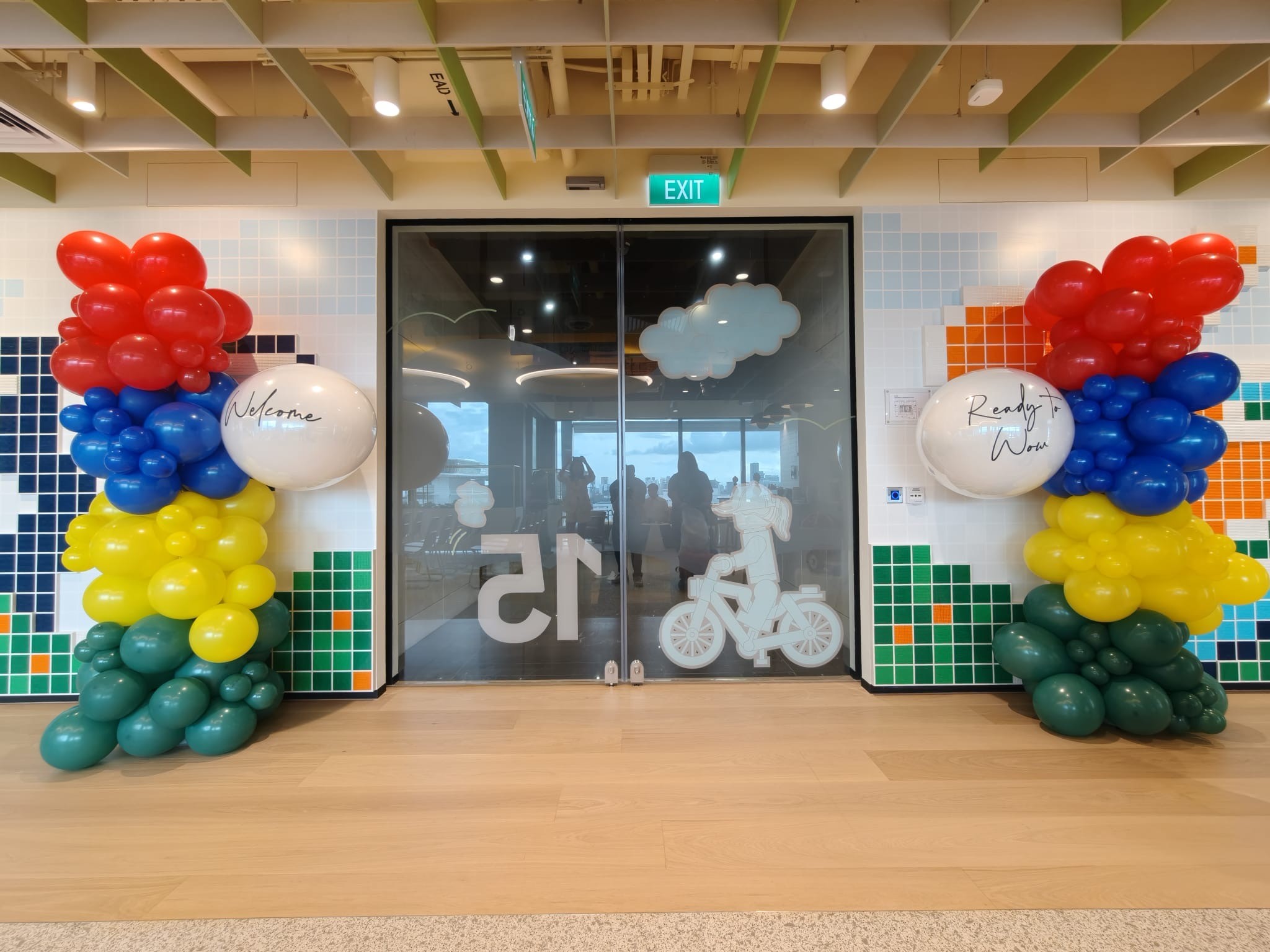 Tropical themed Balloon Decorations Singapore with palm leaves