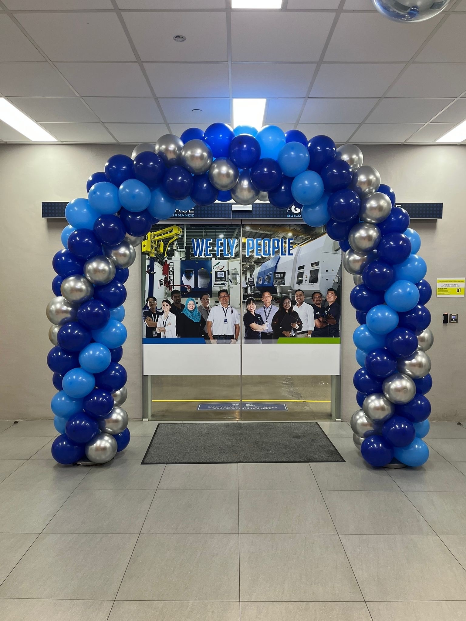 Blue and silver balloon arch entrance for corporate Balloon Decorations Singapore event