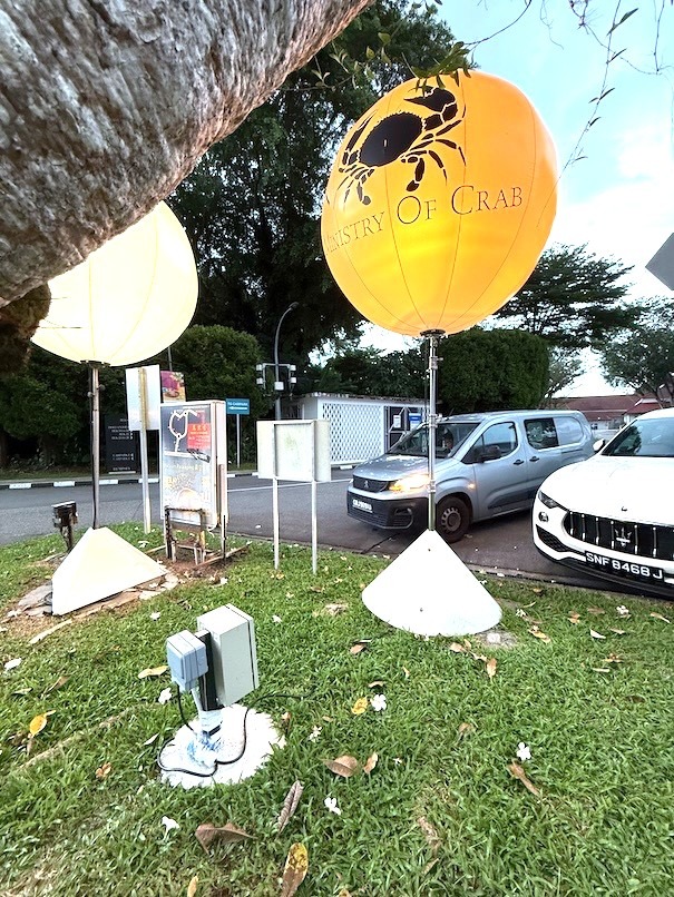 Branded advertising balloon at outdoor restaurant corporate event in Singapore
