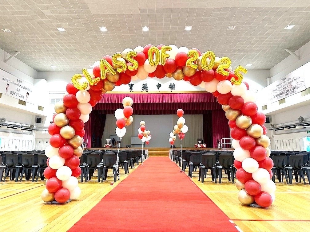 Graduation balloon arch red and gold school hall Balloon Decorations Singapore