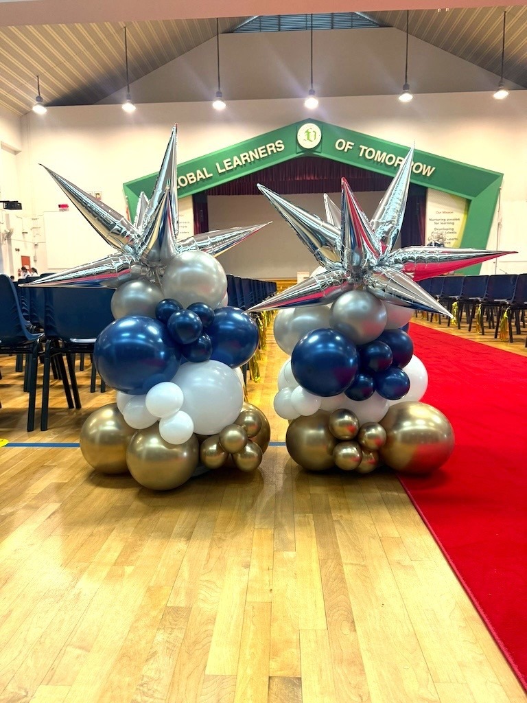 Silver starburst balloon columns school graduation Balloon Decorations Singapore