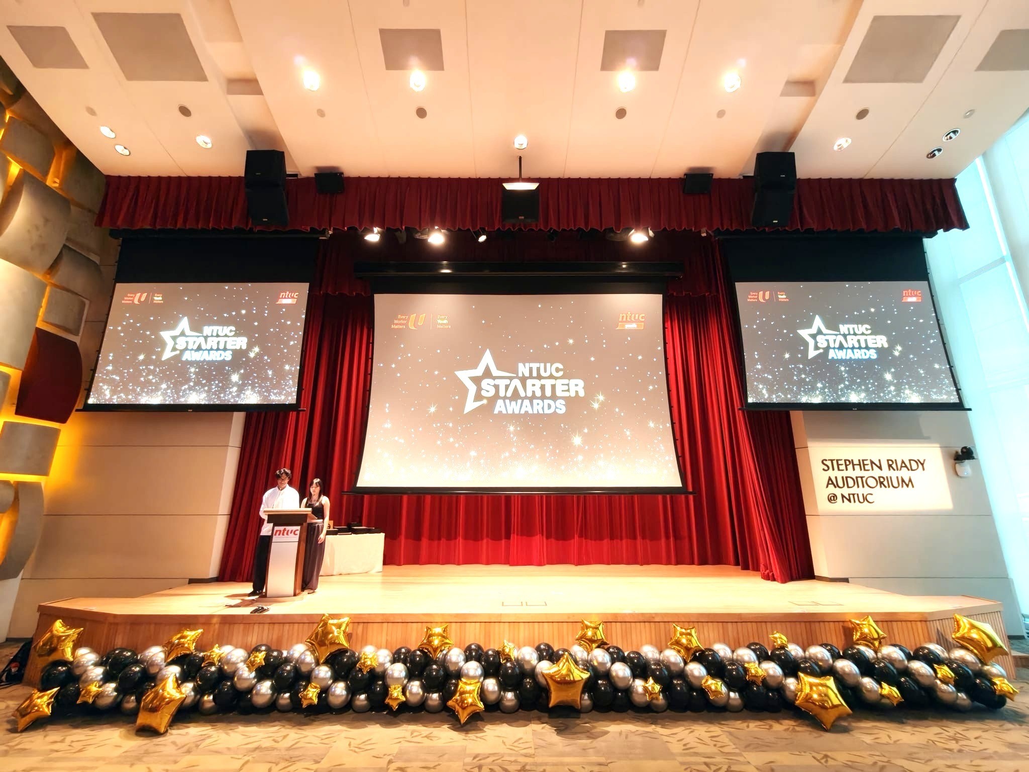 Balloon garland stage decoration for corporate awards ceremony in Singapore