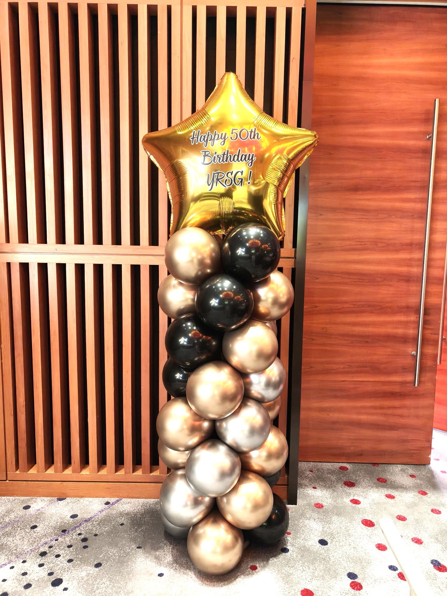 Custom gold and black balloon column birthday balloon decoration Singapore