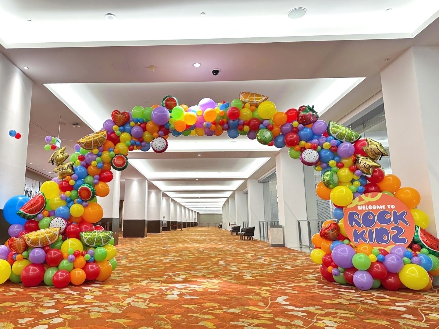 Fruit-themed organic balloon arch kids event balloon backdrop Singapore