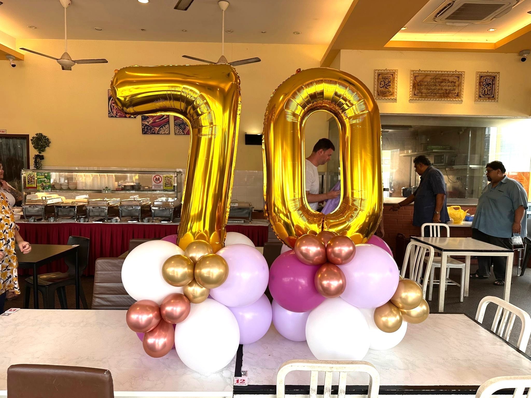 Gold number 70 balloon centerpiece for a milestone birthday balloon decoration Singapore