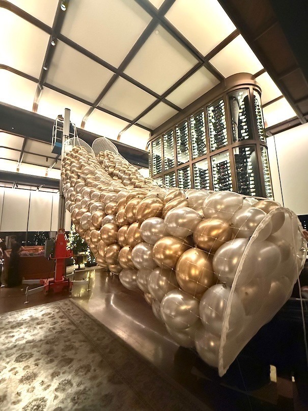Gold and silver chrome balloon sculpture at a luxury venue balloon decoration Singapore