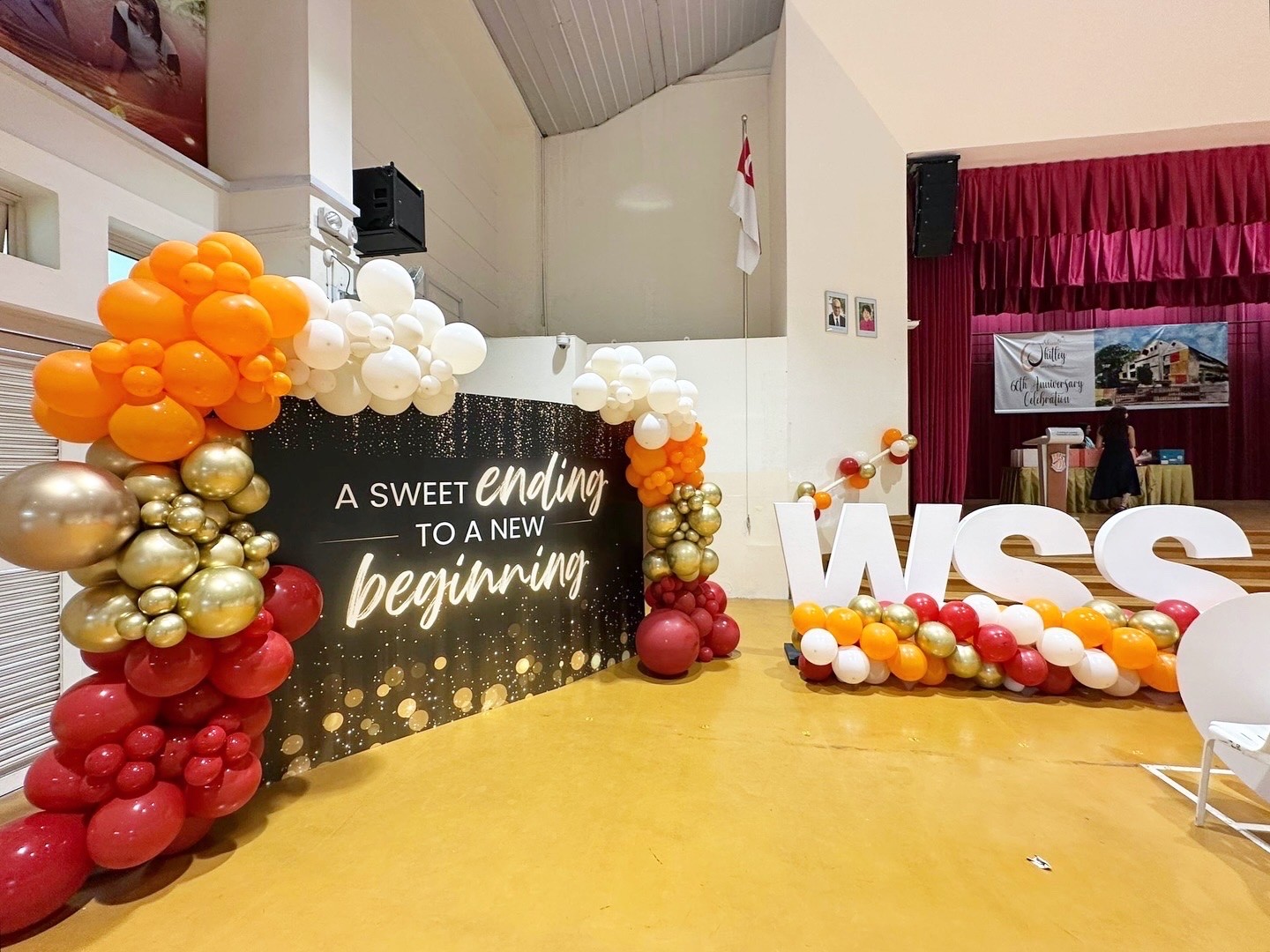 Organic balloon arch backdrop for school event balloon decorations Singapore