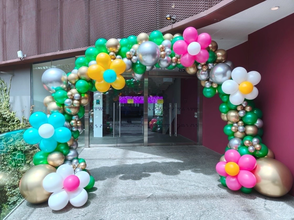 Organic balloon arch with flower theme entrance balloon decorations Singapore