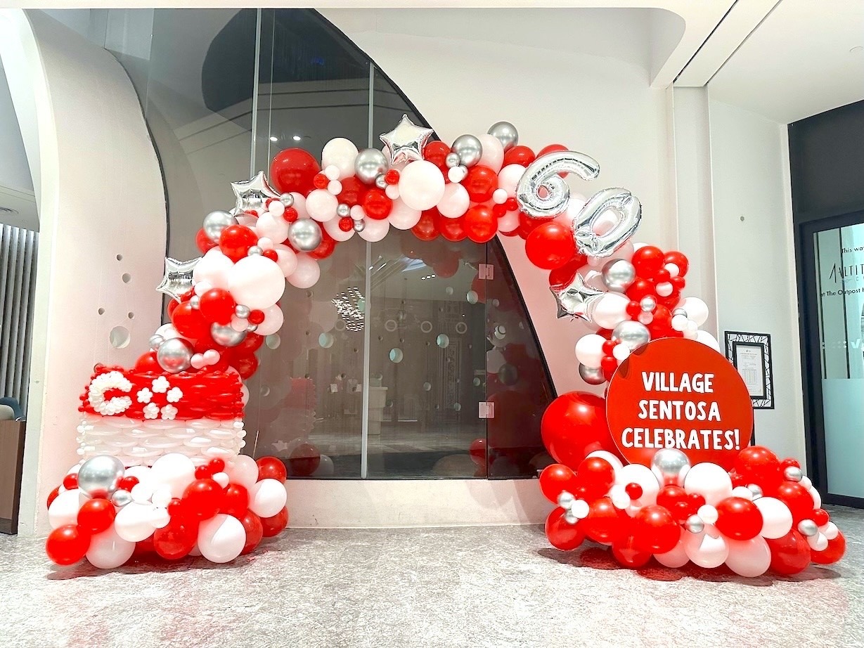 Red and white organic balloon arch for National Day celebration in Singapore