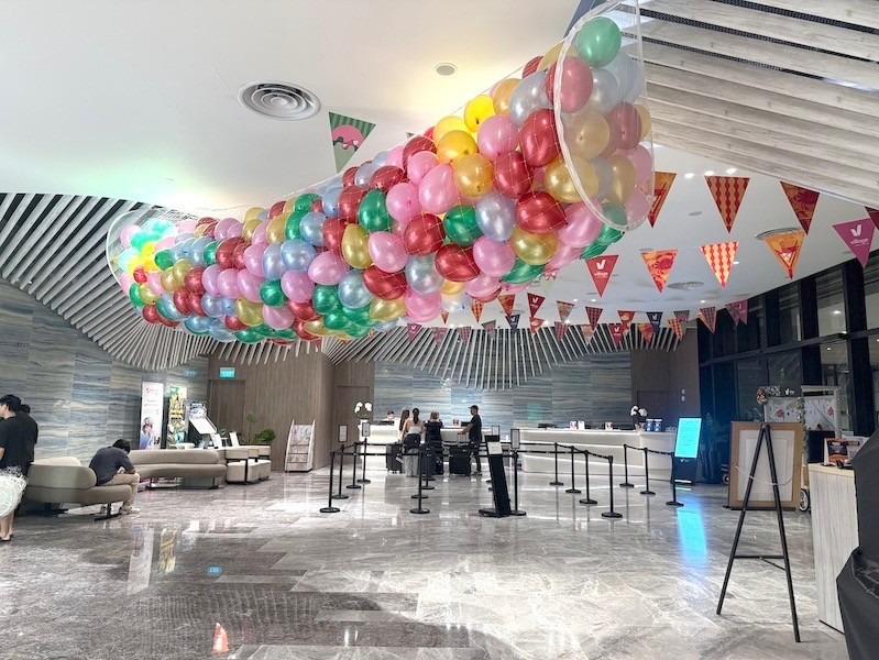 Balloon drop net ceiling installation in lobby event Singapore