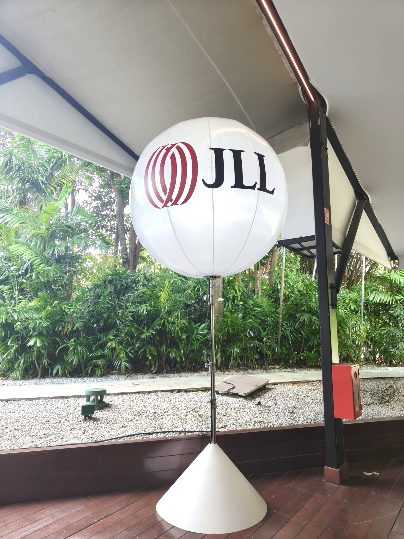 Branded advertising balloon stand at corporate event Singapore