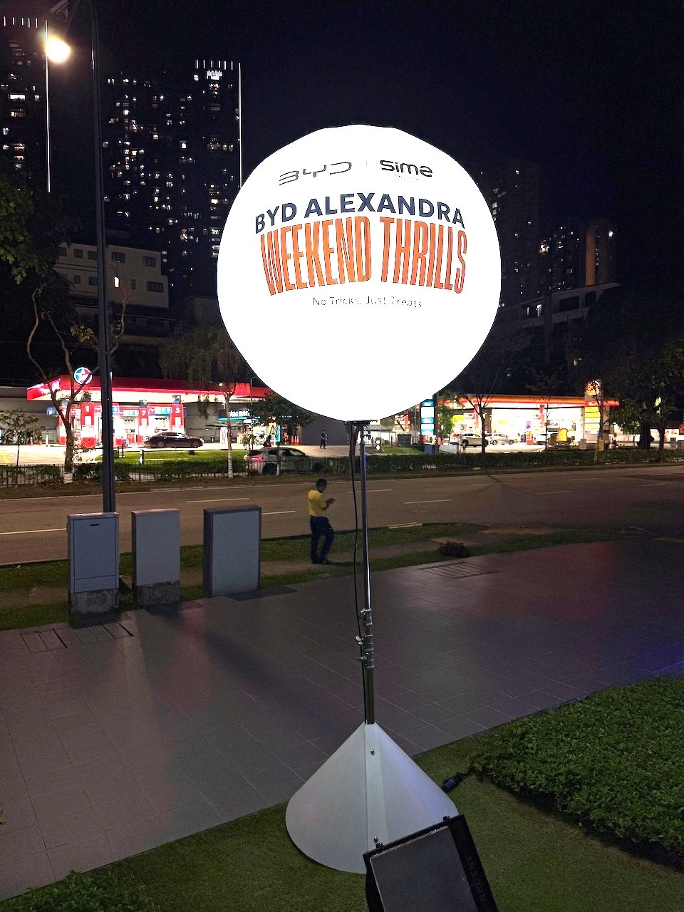 Outdoor corporate branded lighted balloon stand in Singapore