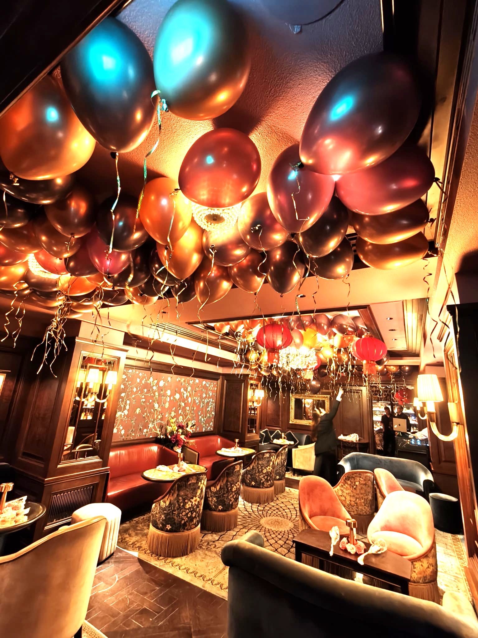 Luxury helium balloon ceiling decoration at a lounge event in Singapore