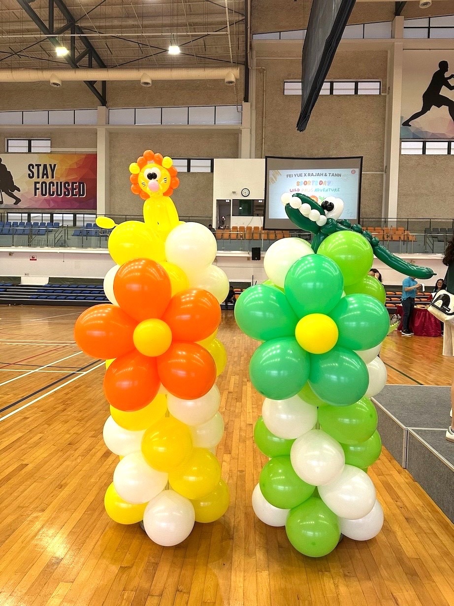 Animal-themed balloon columns for a sports day event decoration in Singapore