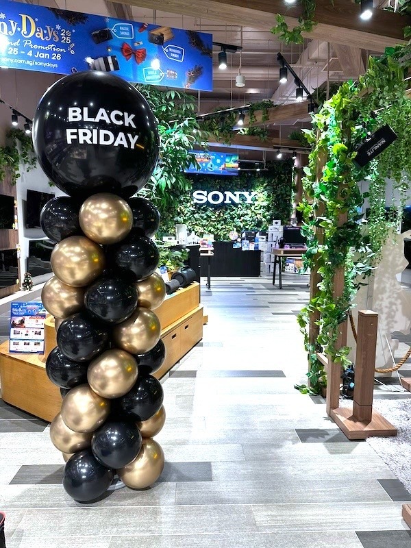Black Friday balloon column decoration inside a retail store in Singapore