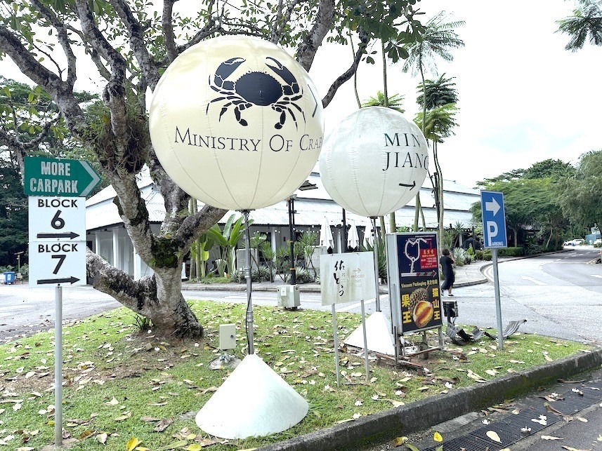 Branded advertising balloon stands at outdoor restaurant in Singapore