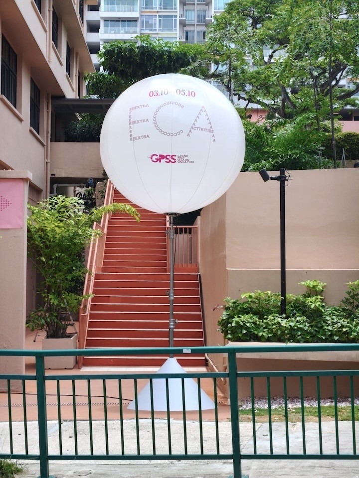 Large advertising balloon on stand for outdoor event in Singapore